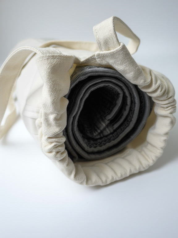 housse de tapis de prière avec un tapis gris