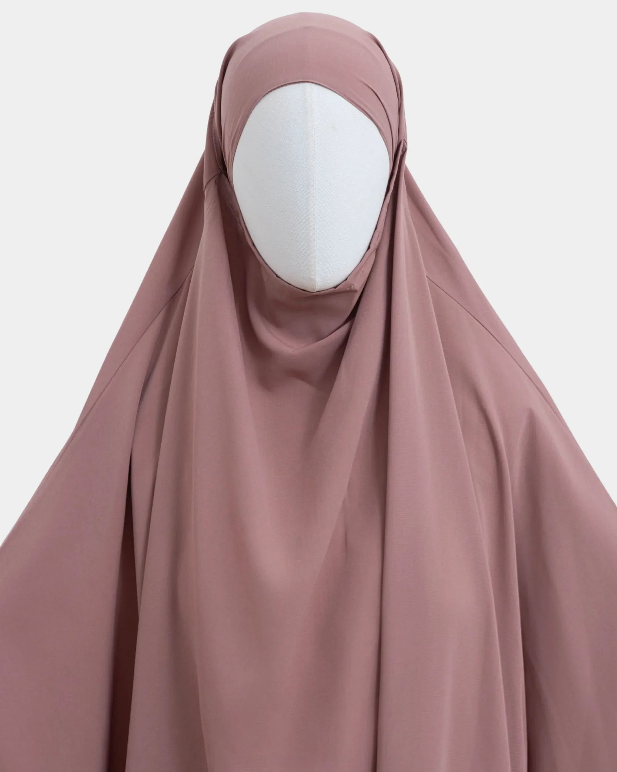 Capuche du jilbab beige rosé et drapé du tissu sur le buste