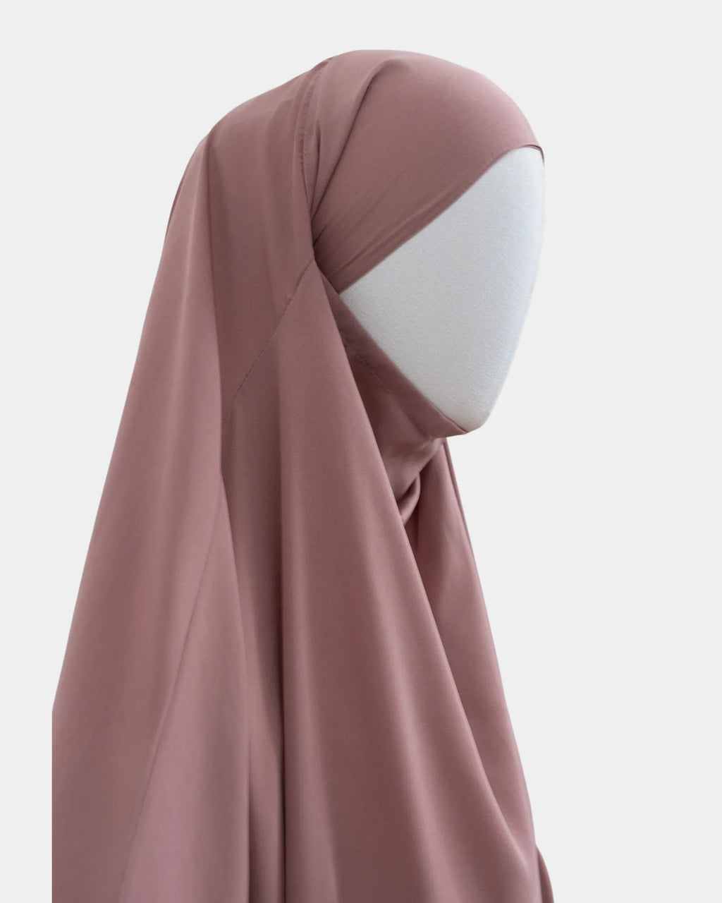 Capuche du jilbab beige rosé vue de profil, tombé couvrant sur l'épaule