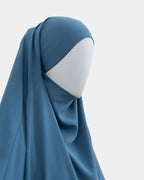 Jilbab 1 pièce bleu jean vu de profil, capuche couvrante et large tombé