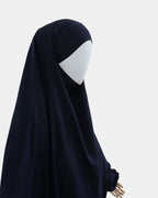 Jilbab 1 pièce bleu marine vu de profil, capuche couvrante et large tombé