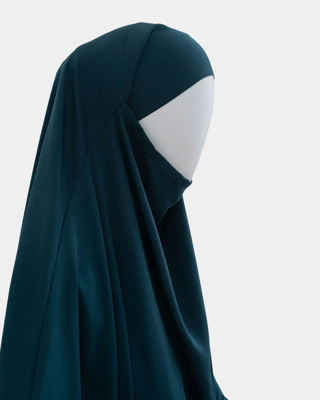 Jilbab 1 pièce bleu pétrole vu de profil, capuche couvrante et large tombé