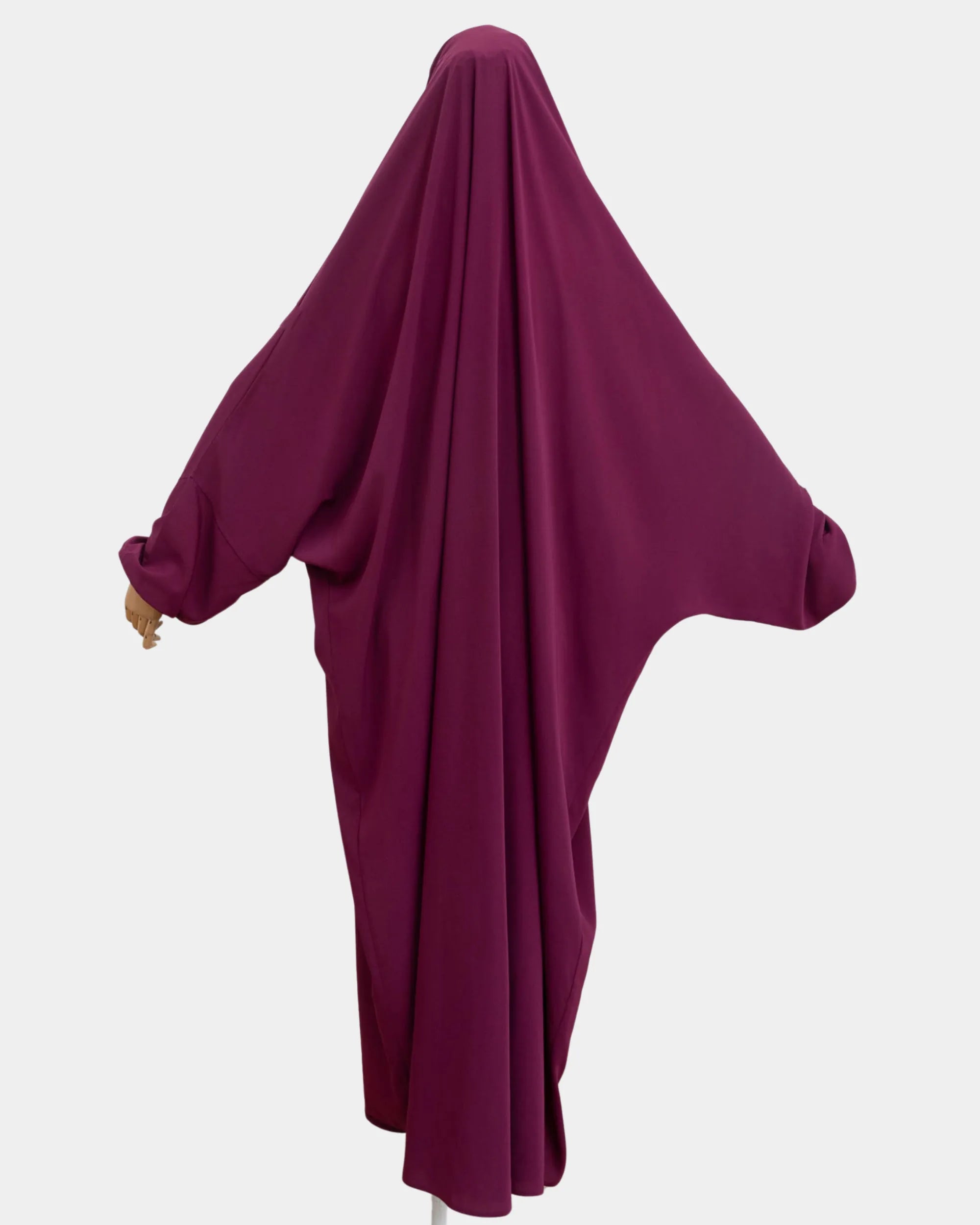 Vue de dos du jilbab 1 pièce fuchsia, coupe ample et non moulante