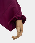 Manche du jilbab fuchsia avec poignet élastiqué qui maintient la manche en place