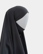Jilbab 1 pièce gris foncé vu de profil, capuche couvrante et large tombé
