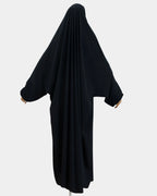 Vue de dos du jilbab 1 pièce noir, coupe ample et non moulante