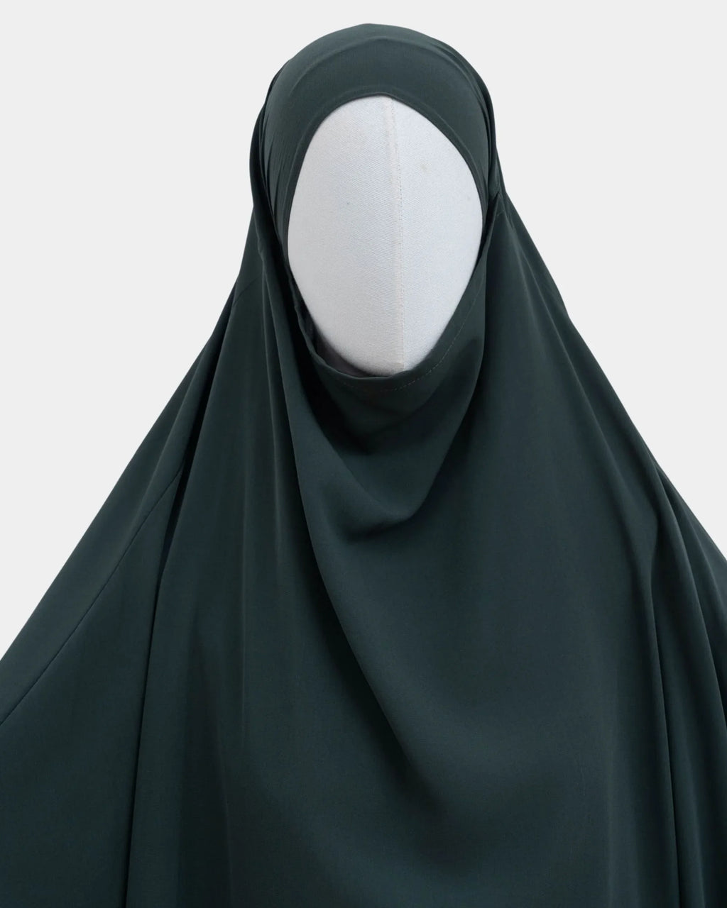 Capuche du jilbab vert kaki et drapé du tissu sur le buste