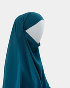 Capuche du jilbab 2 pièces bleu canard vue de profil, tombé couvrant sur l'épaule