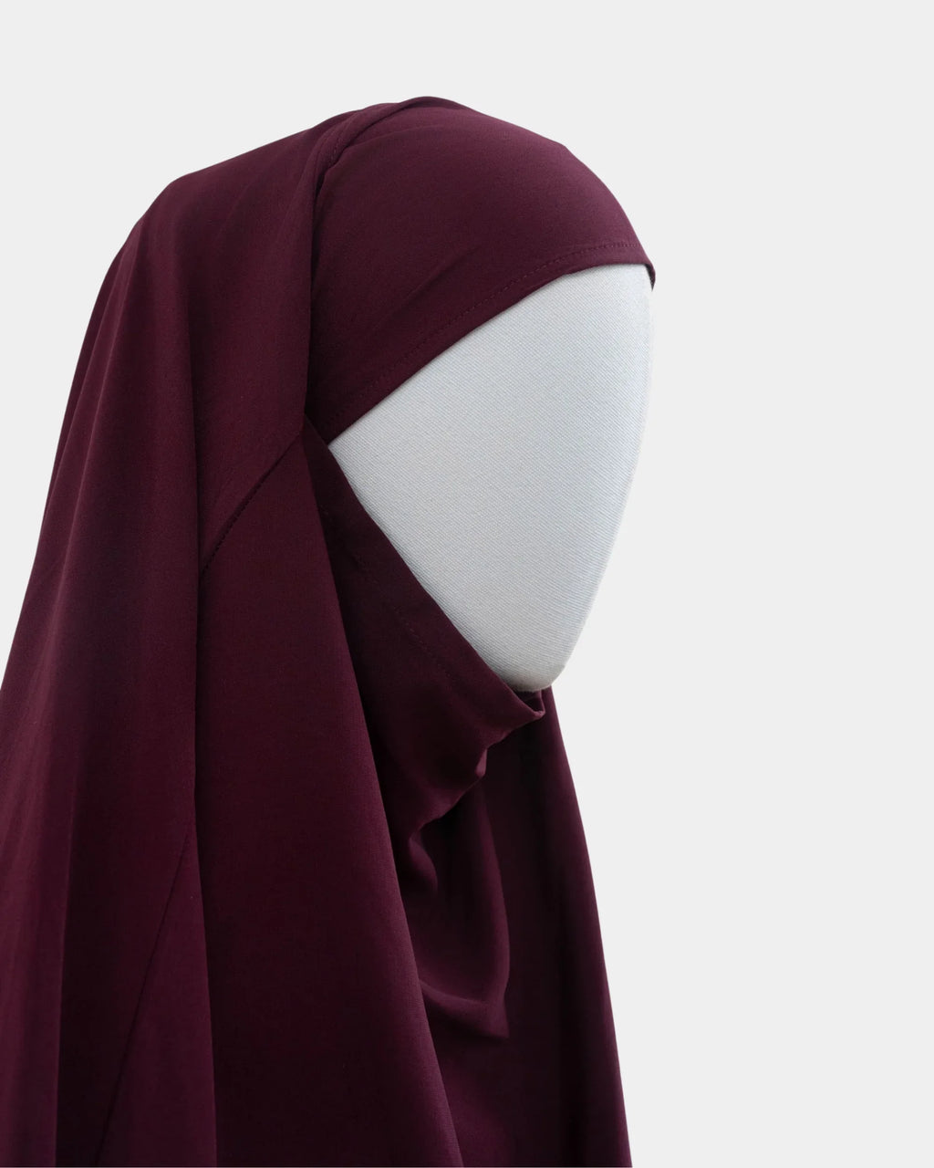 Capuche du jilbab 2 pièces bordeaux vue de profil, tombé couvrant sur l'épaule
