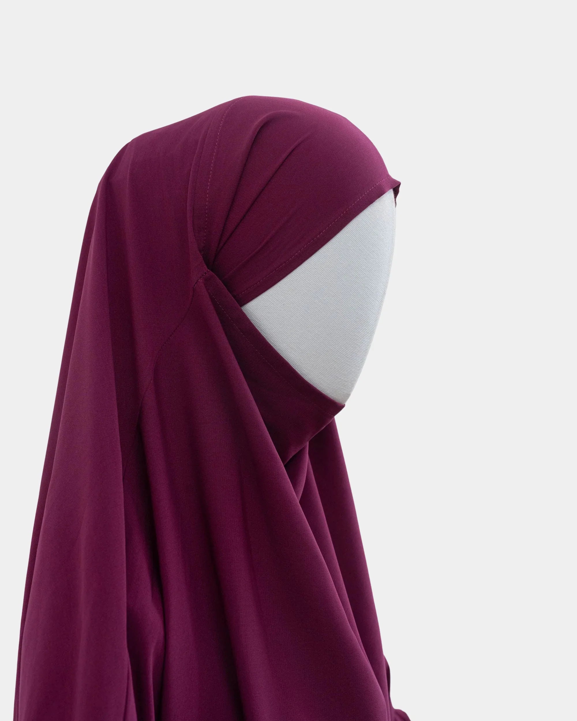 Capuche du jilbab 2 pièces fuchsia vue de profil, tombé couvrant sur l'épaule