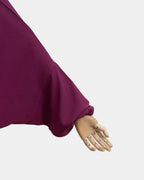 Manche du jilbab 2 pièces fuchsia avec poignet élastiqué qui maintient la manche en place