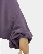 Manche du jilbab 2 pièces lilas avec poignet élastiqué qui maintient la manche en place