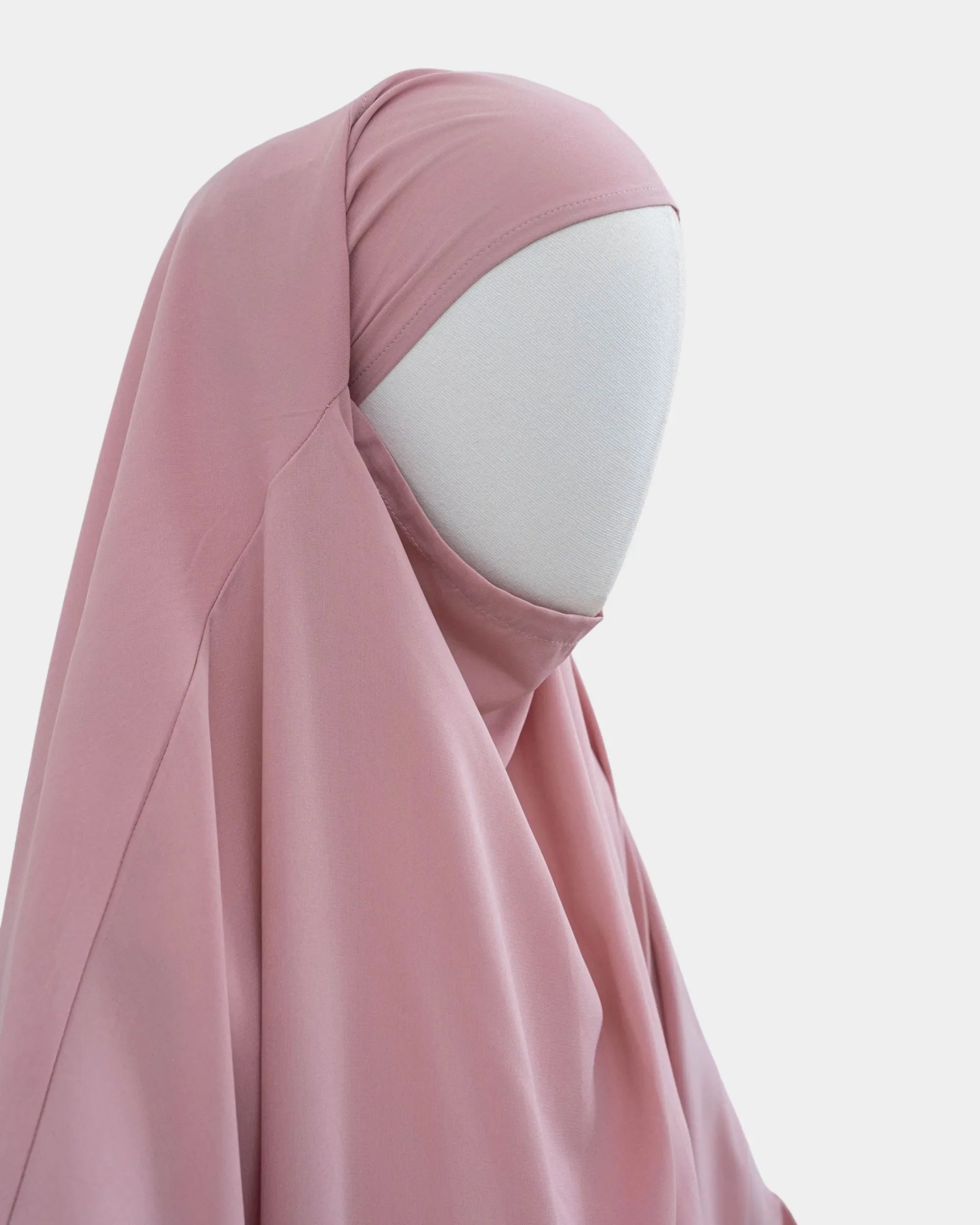 Capuche du jilbab 2 pièces rose vue de profil, tombé couvrant sur l'épaule